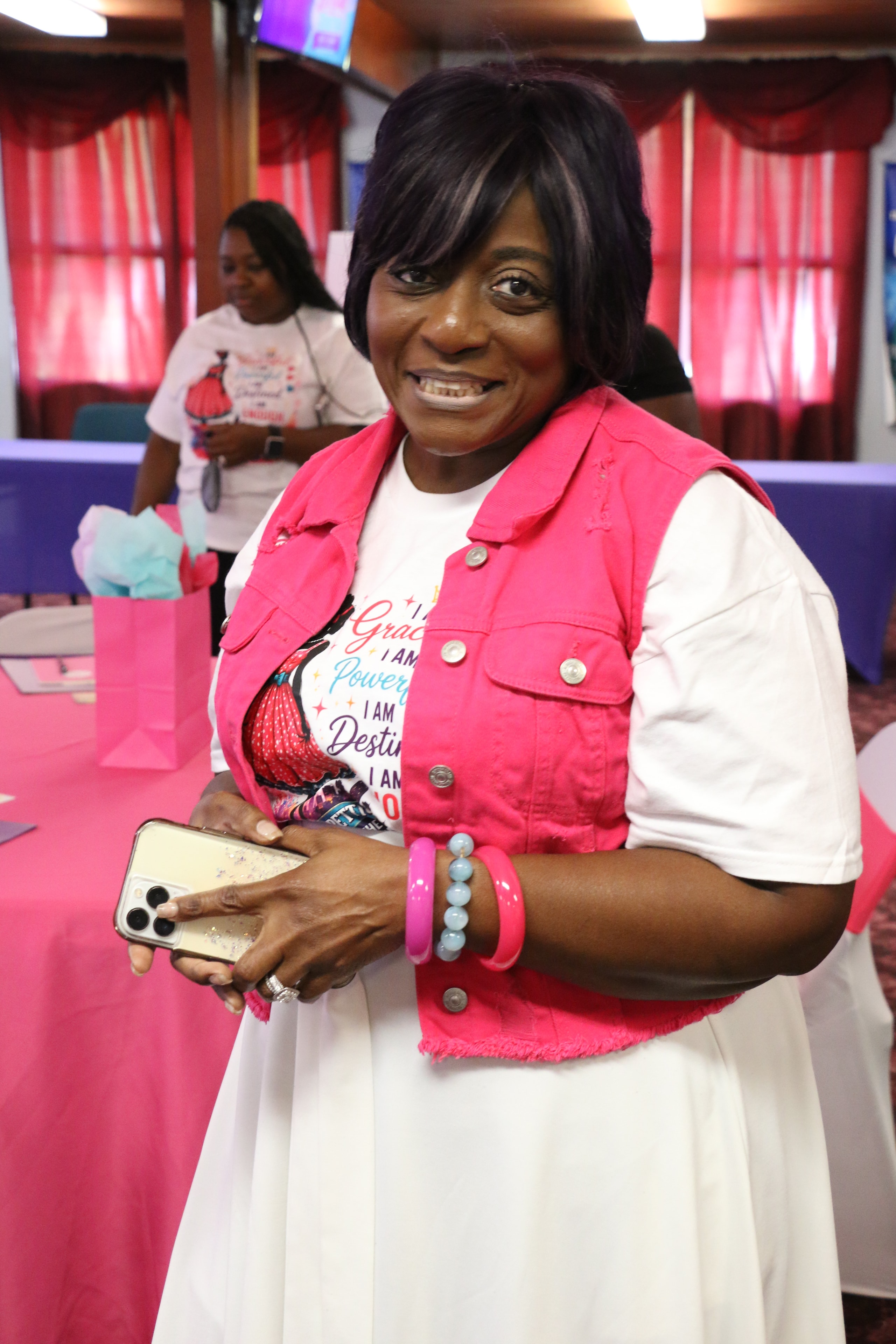 Attendee in pink at the Petticoat Junction Day Camp event